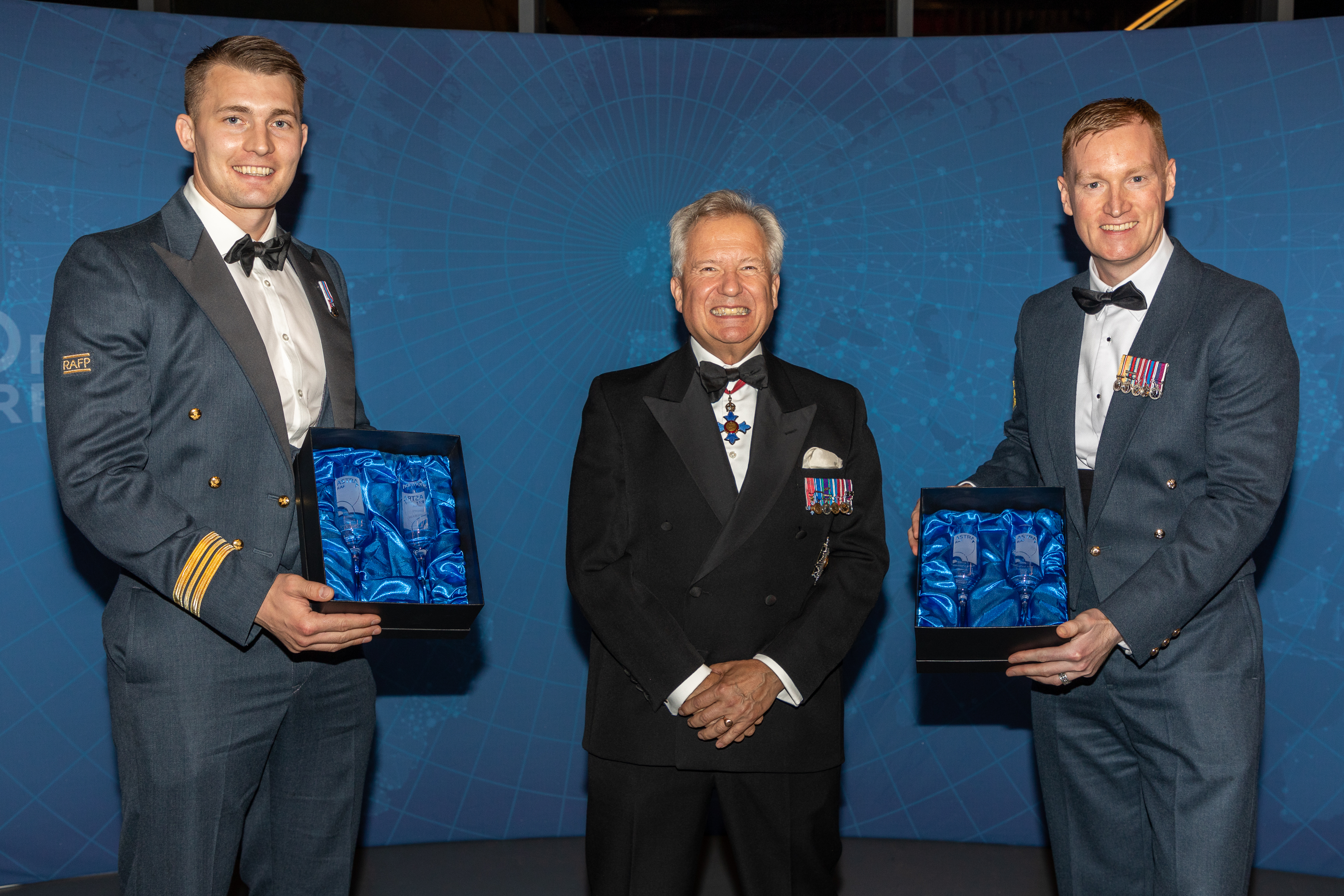 Squadron Leader John Barrowcliff and Flight Sergeant Si Ball being presented with the Astra Innovation Award